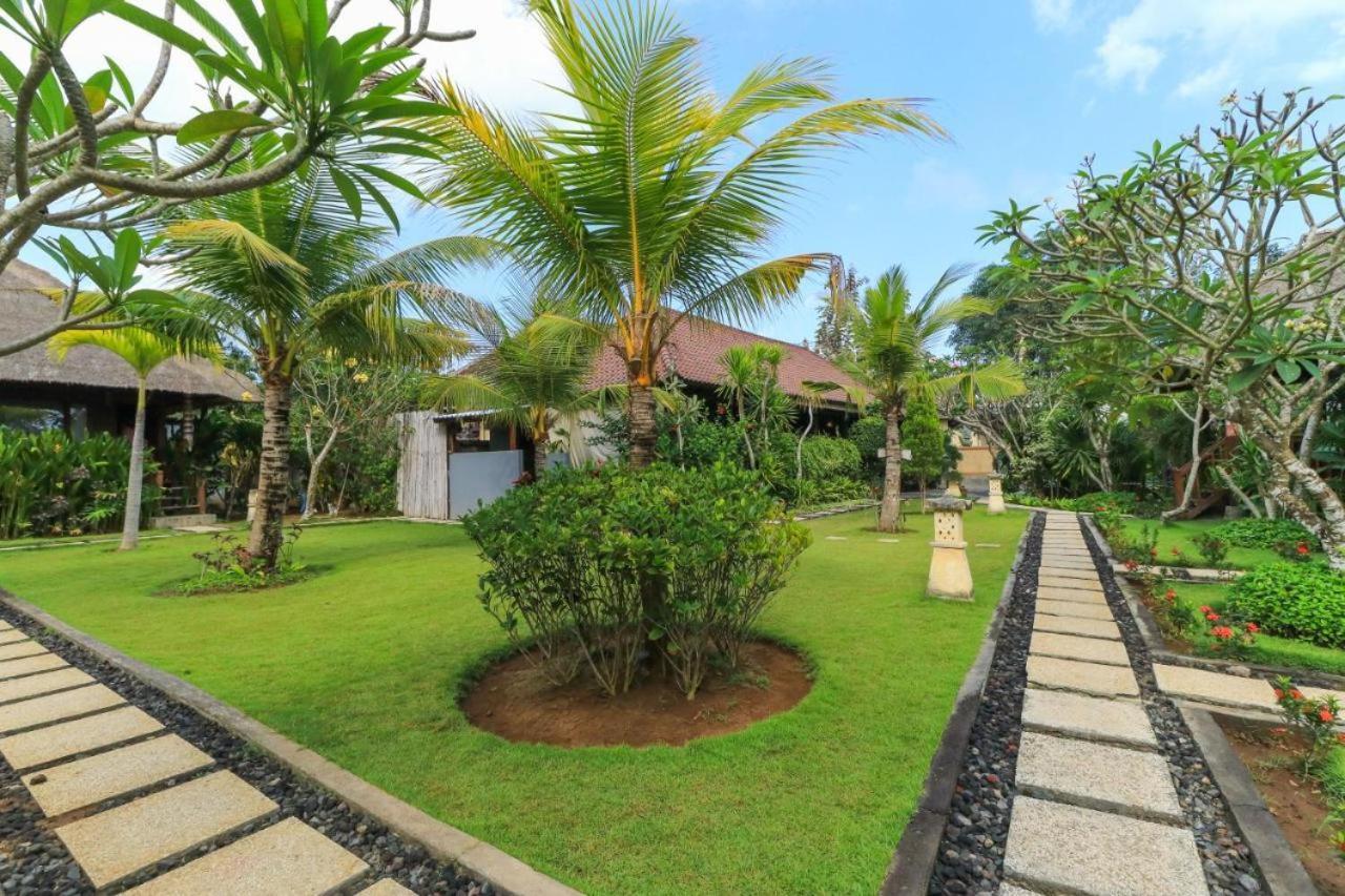 Koji Garden Huts Hotel นูซาเลมโบงัน ภายนอก รูปภาพ