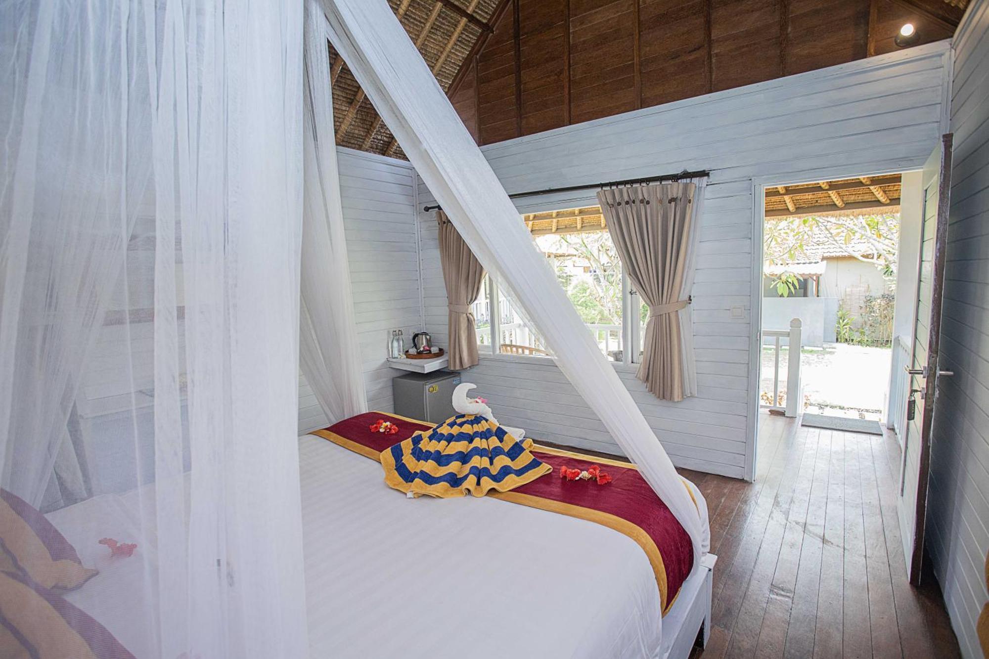 Koji Garden Huts Hotel นูซาเลมโบงัน ภายนอก รูปภาพ