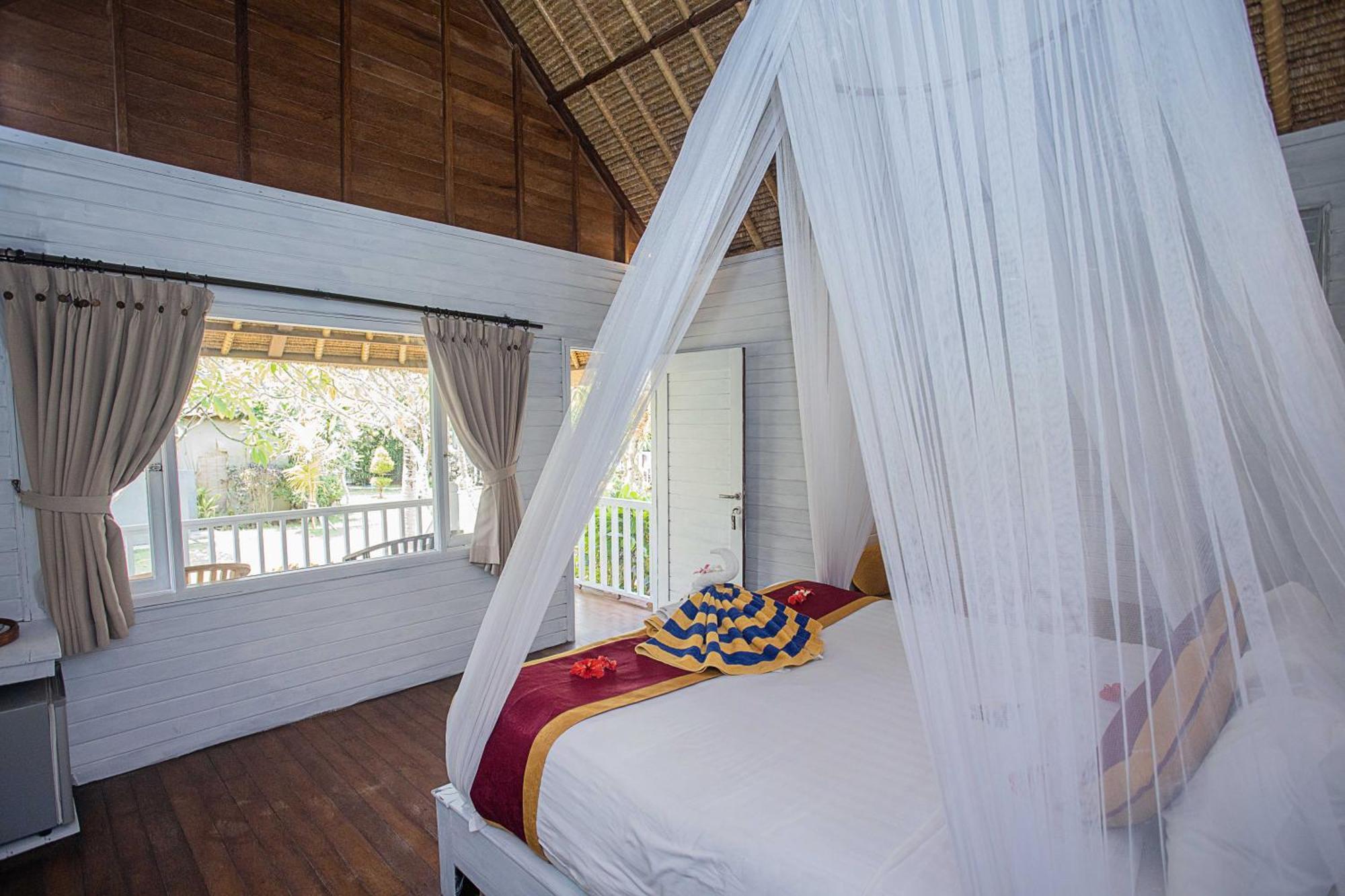 Koji Garden Huts Hotel นูซาเลมโบงัน ภายนอก รูปภาพ